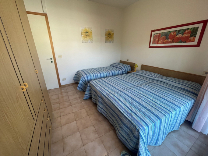 Room 5, Chic Retreat for Your Holidays in Bibione, Venezia