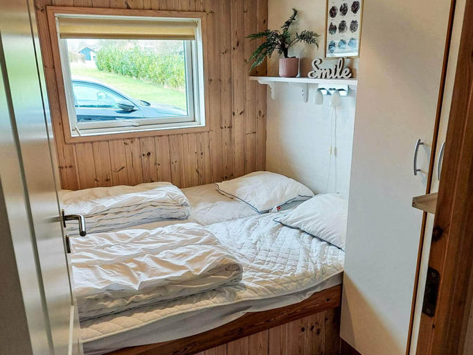 Bedroom 3, 5 star holiday home in Juelsminde, Hedensted