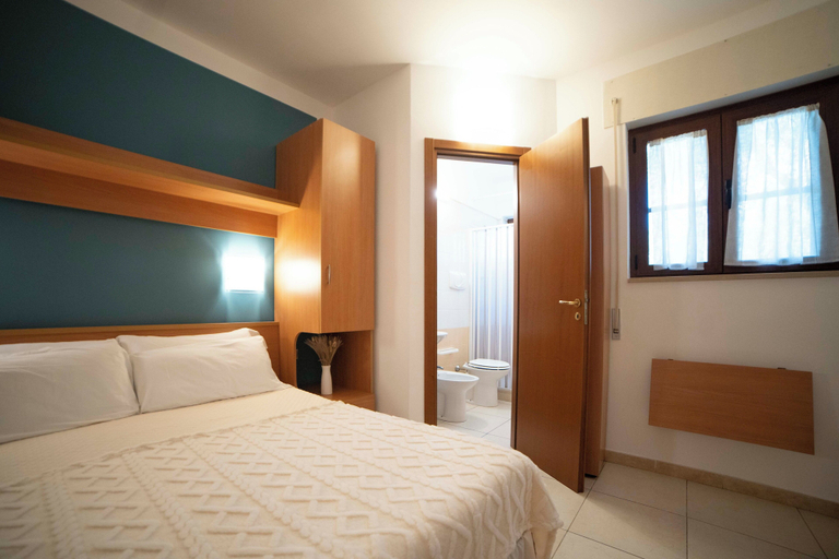 Bedroom 3, Ferienwohnung "ulivo" mit Pool und Privatstrand -1, Foggia