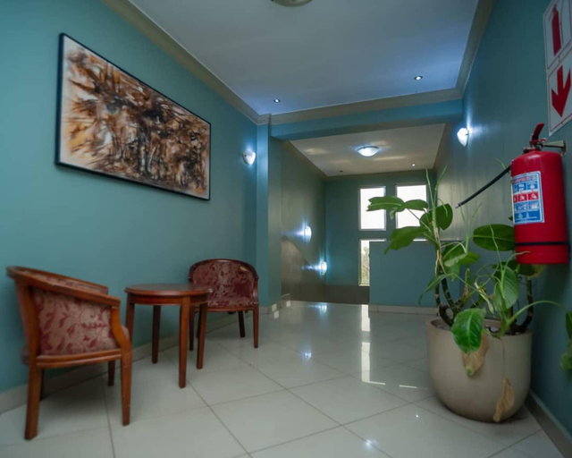 Living area 3, Room-a Charming Bed in Lubumbashi, Lubumbashi