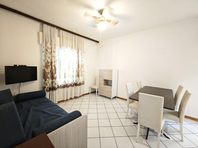 Living room, Quiet, modern ground-floor apartment in Lignano, Udine