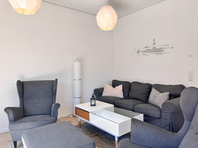 Living room 2, Moderne Ferienwohnung mit Sauna & Terrasse, Wesermarsch
