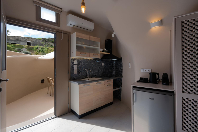 Kitchen, Litheos Santorini Luxury Cave Suites, South Aegean