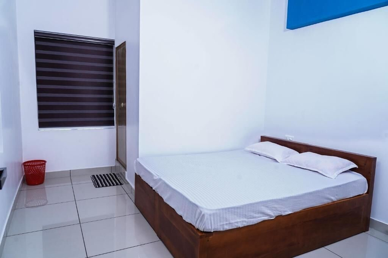 Room 2, Thekkumpuram Residency, Malappuram