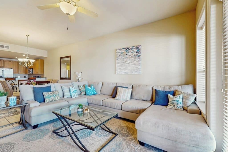 Living area, Dog-friendly & Spacious Condo With Lake Views, Large Balcony, & Pool, Llano