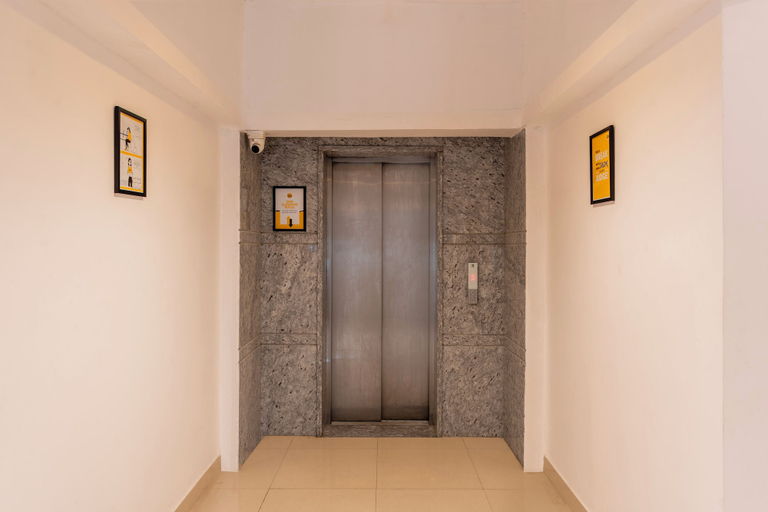Elevator 2, Itsy Hotels Cozy Retreat - Near Mysore Palace & Zoo, Mysore