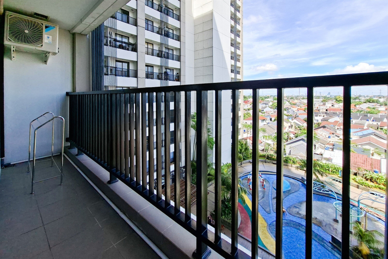 Balcony, Homey Beige Tinted 1Br At Apartment Anwa Residence, Tangerang Selatan