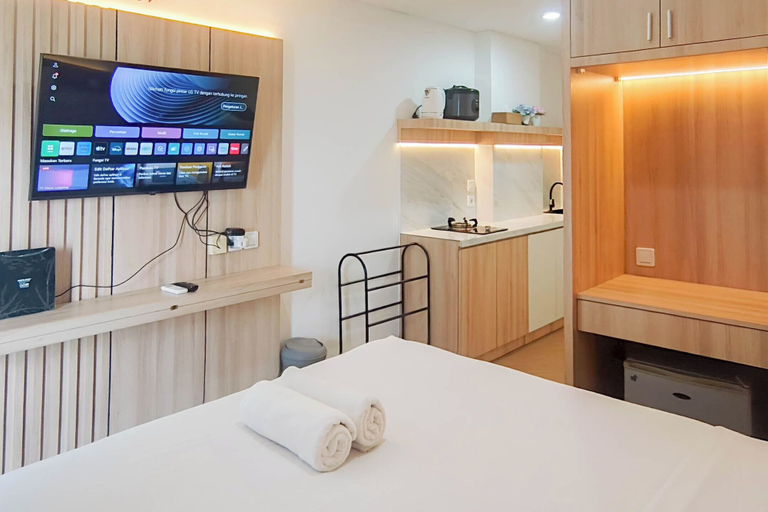Television, Practical Studio At Tamansari Skylounge Makassar Apartment, Makassar