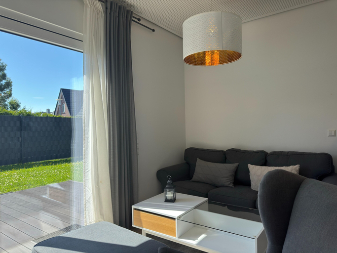 Living room 4, Moderne Ferienwohnung mit Sauna & Terrasse, Wesermarsch