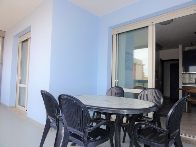 Dining room, Beachside Comfort With Pool and Terrace, Venezia