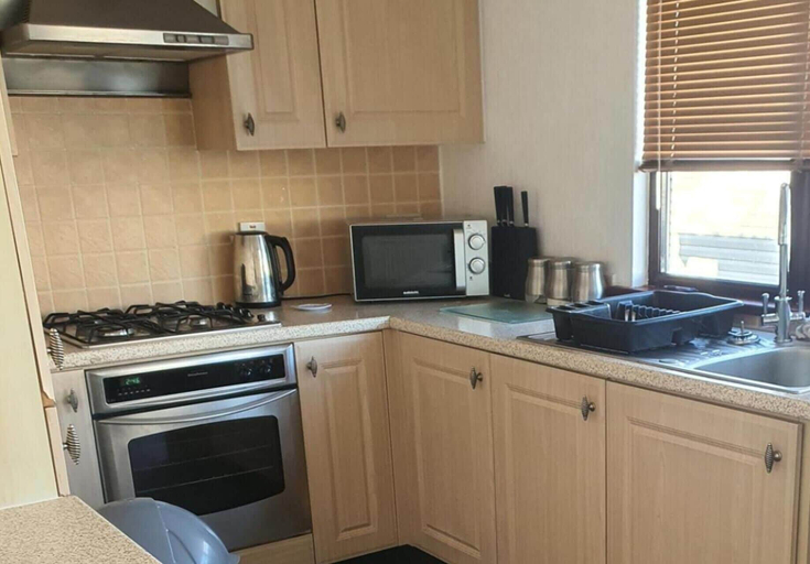 Private kitchen 3, Wooden Lodge Sleeps 9 with Veranda & Decking, Lancashire