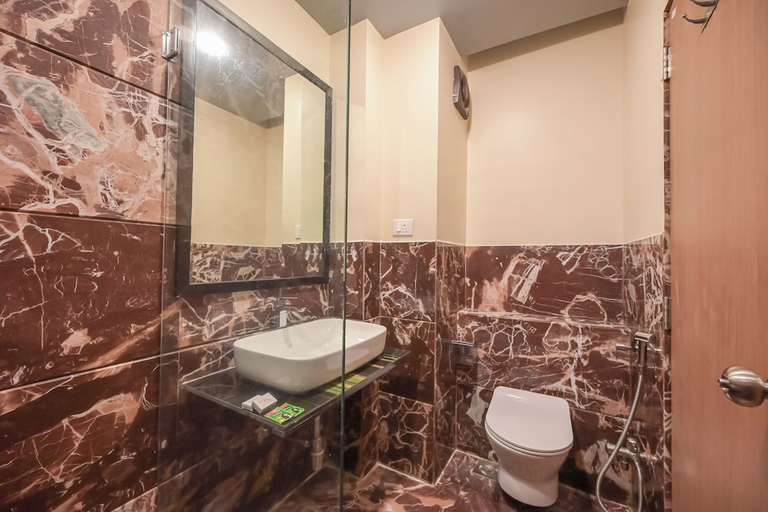 Bathroom 4, Hotel Aristro, Pune