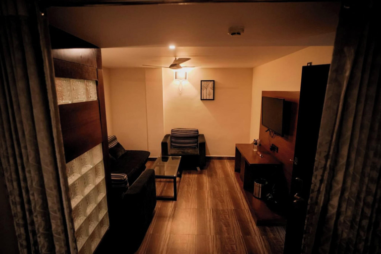 Living area, Hotel New Indraprastha, Pathanamthitta