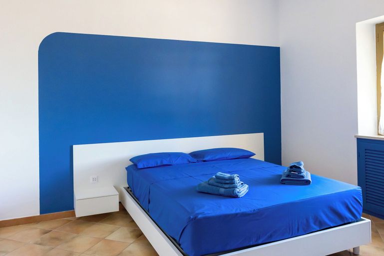 Room 2, Lilium Ariana Apartment by Mamo Florence, Latina