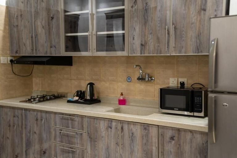 Private kitchen, Jawharat Al Nafel Serviced Apartments, Riyadh