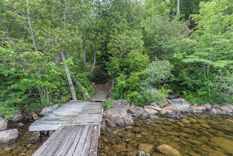 View from property 4, Gorgeous Lakefront Home w/ Dock, Canoe, Kayaks & Lake/forest Views, Hancock