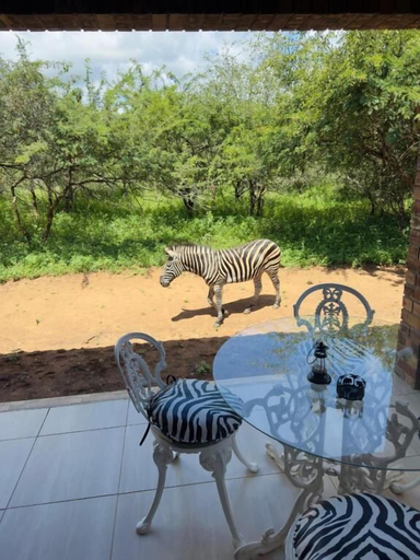 Outdoor dining 5, Kruger Afrique Lodge, Ehlanzeni