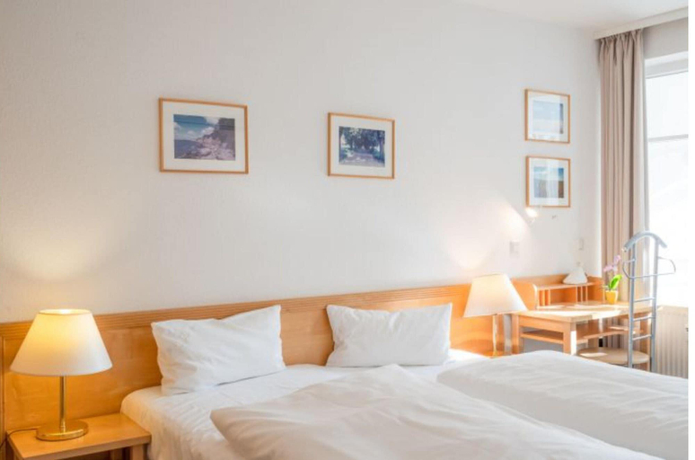 Room 4, Ferienwohnung mit Balkon und Fitnessbereich in Sellin, Vorpommern-Rügen
