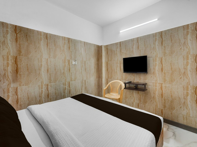 Room 5, Deluxe Krishna Riverview Vijayawada Sikara, Chennai