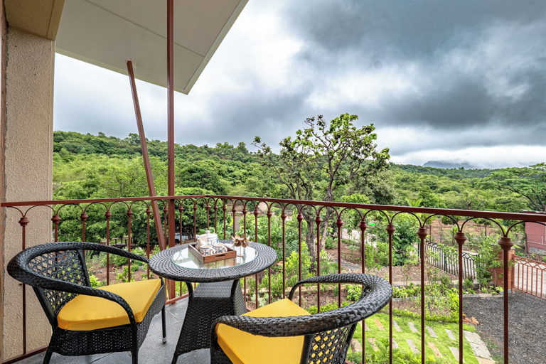 Outdoor dining 4, CosmicStays Yutori, Pune