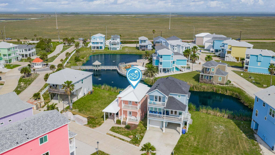 Exterior 4, Coastal Charm With Pond Views and Sunset Balconies!, Nueces