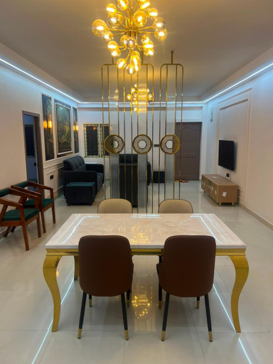Shared lounge/TV area 2, Erramanzil service apartment, Hyderabad
