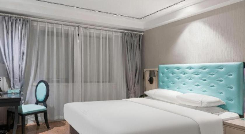 Bedroom 2, Qingdao Galaxy Holiday Hotel, Qingdao