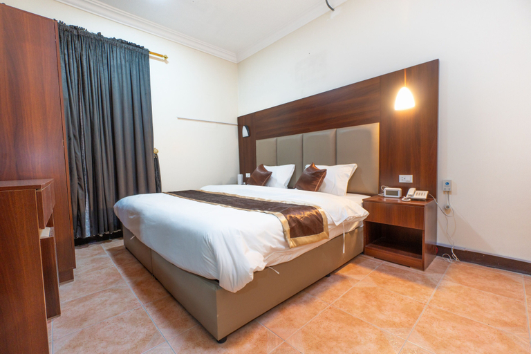 Bedroom 2, Al Eairy Serviced Apartments Company is a one-person company 4, Al Ahsa