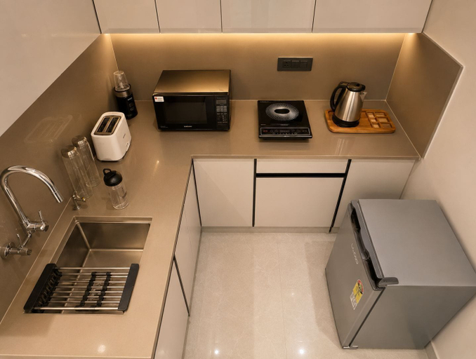 Private kitchen, Art Luxury Service Apartment Golf Course Road, Gurgaon