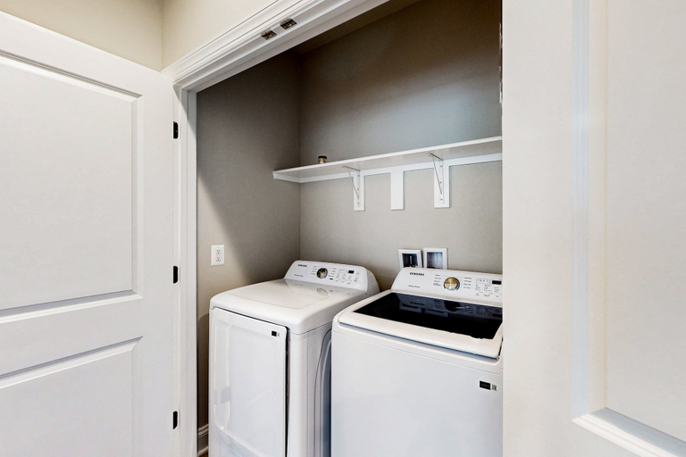 Laundry, Charming Lakefront Retreat With Game Room and Covered Dock Access, Louisa