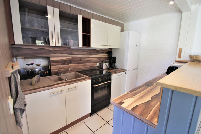 Private kitchen 2, Modernly Furnished Double Bungalow With Terrace in the Mirow Holiday Park, Mecklenburgische Seenplatte