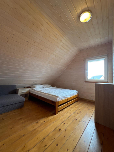 Bedroom 3, Domki wakacyjne z kominkiem nad morzem i jeziorem, Sławno