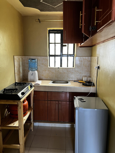 Private kitchen, Impeccable Homely 1-bed Apartment in Nairobi, Embakasi East