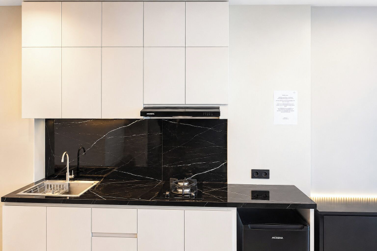 Private kitchen 4, Restful Combined 2Br At Apartment Tamansari Skylounge Balikpapan, Balikpapan