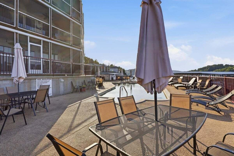 Outdoor dining 4, Lakefront on Big Niangua, 2 Heated Pools, Boat Slip, Fire Pit, & Big Views, Camden