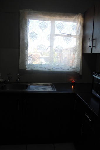 Private kitchen, A Penthouse Room in Downtown Bloemfontein, Mangaung