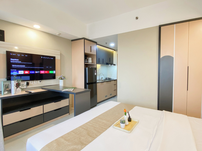 Television, Bright And Warm Studio Room At Apartment Lrt City Jatibening, Bekasi