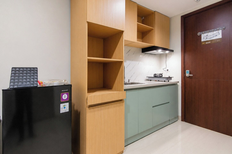 Private kitchen, Airy Contemporary Studio At Grand Sungkono Lagoon Apartment, Surabaya