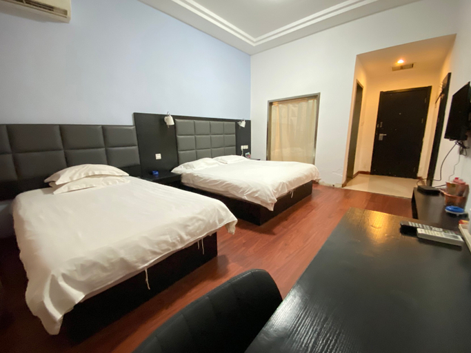 Bedroom 2, Tiantian Holiday Hotel (Puyang Wanda Plaza Shuixiu Street), Puyang