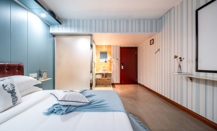 Bedroom 2, Tiantian Theme Hotel (Haikou Riyue Square Yelin Road Branch), Haikou