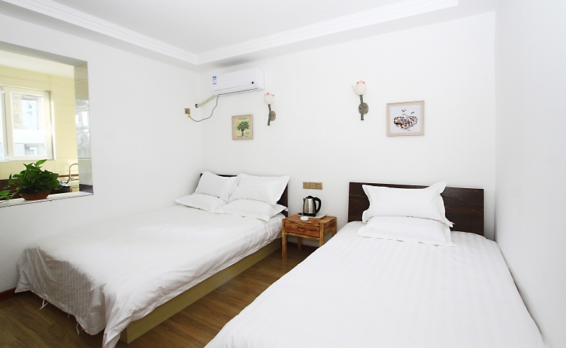 Bedroom 2, Chunrun Courtyard Hotel (Weihai Golden Beach Bathing Beach), Weihai