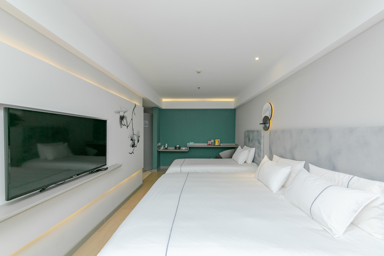 Bedroom 2, Magnotel (Qionghai Wanquan River Aihua Road), Hainan