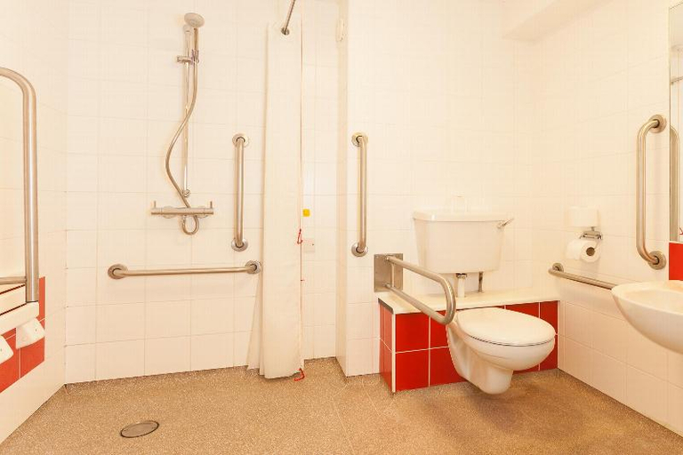 Bathroom 3, Travelodge Bradford Central, Bradford