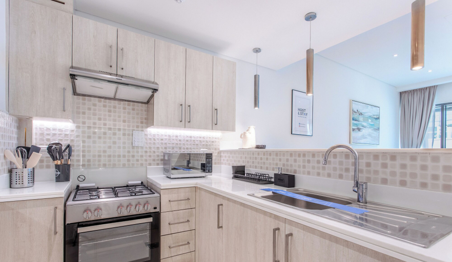 Private kitchen 5, 1BR at Seven Palm - Host & Stay, Dubai