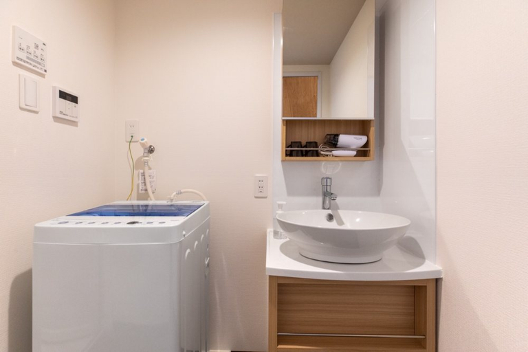 Bathroom 4, Mr.KINJO in front of Manza Beach, Onna