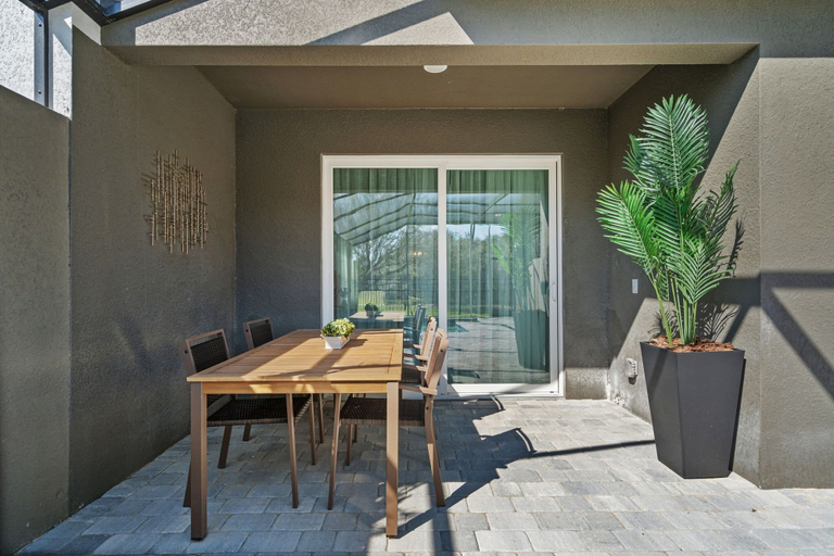 Outdoor dining, Modern 5BR Home Near Disney With Private Pool, Osceola
