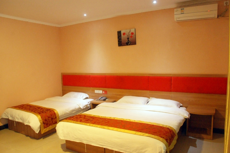 Bedroom 2, JUNYI Hotel Shandong Zaozhuang Shanting District Xinyuan Road, Zaozhuang