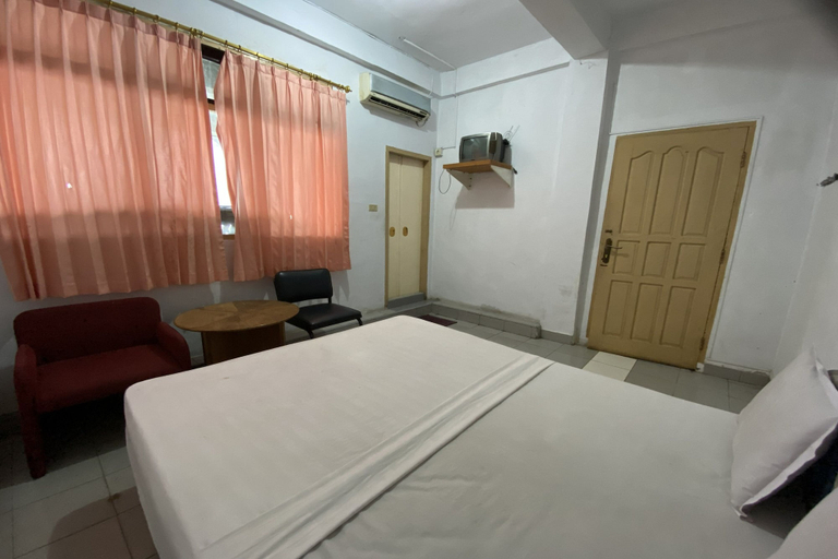 Room 5, Hotel O near RS Awal Bros Sudirman, Pekanbaru