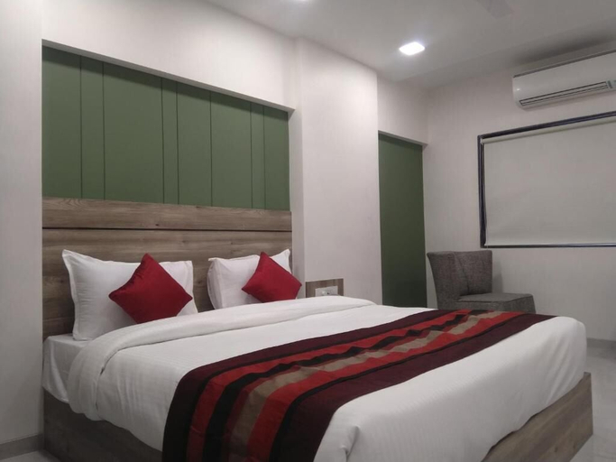 Bedroom 3, Hotel Indus Inn, Pune