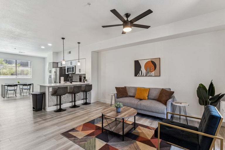 Living area 2, CozySuites at Zone Westgate, Maricopa